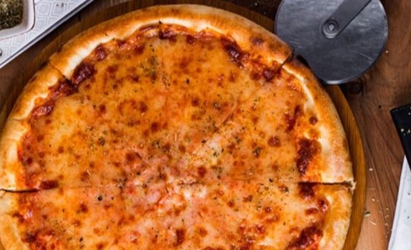 Pizza y empanada: la noche más esperada del 2026