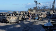 Los autos quedaron hechos cenizas en la zona donde el marplatense debió abandonar el suyo. Foto cortesía Rick Bowmer, AP.